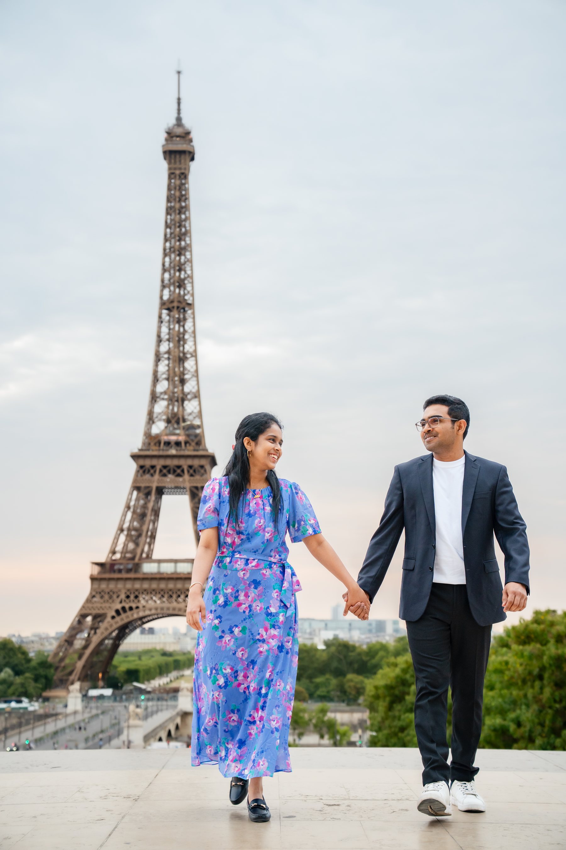Gayathri and Madhav walking in Paris